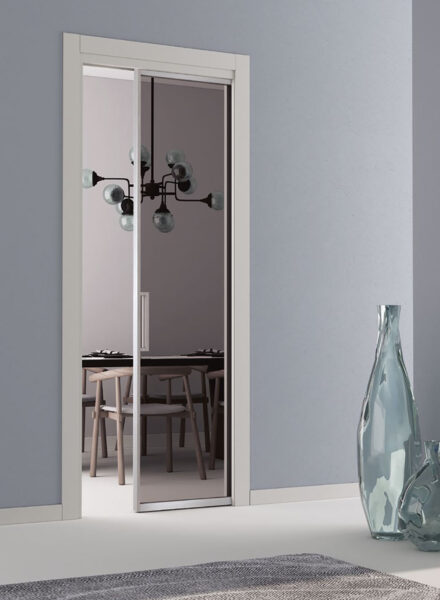 Venere Visioni - Porta in vetro scorrevole interno muro con telaio Venere Visioni - Porta in vetro scorrevole interno muro con telaio